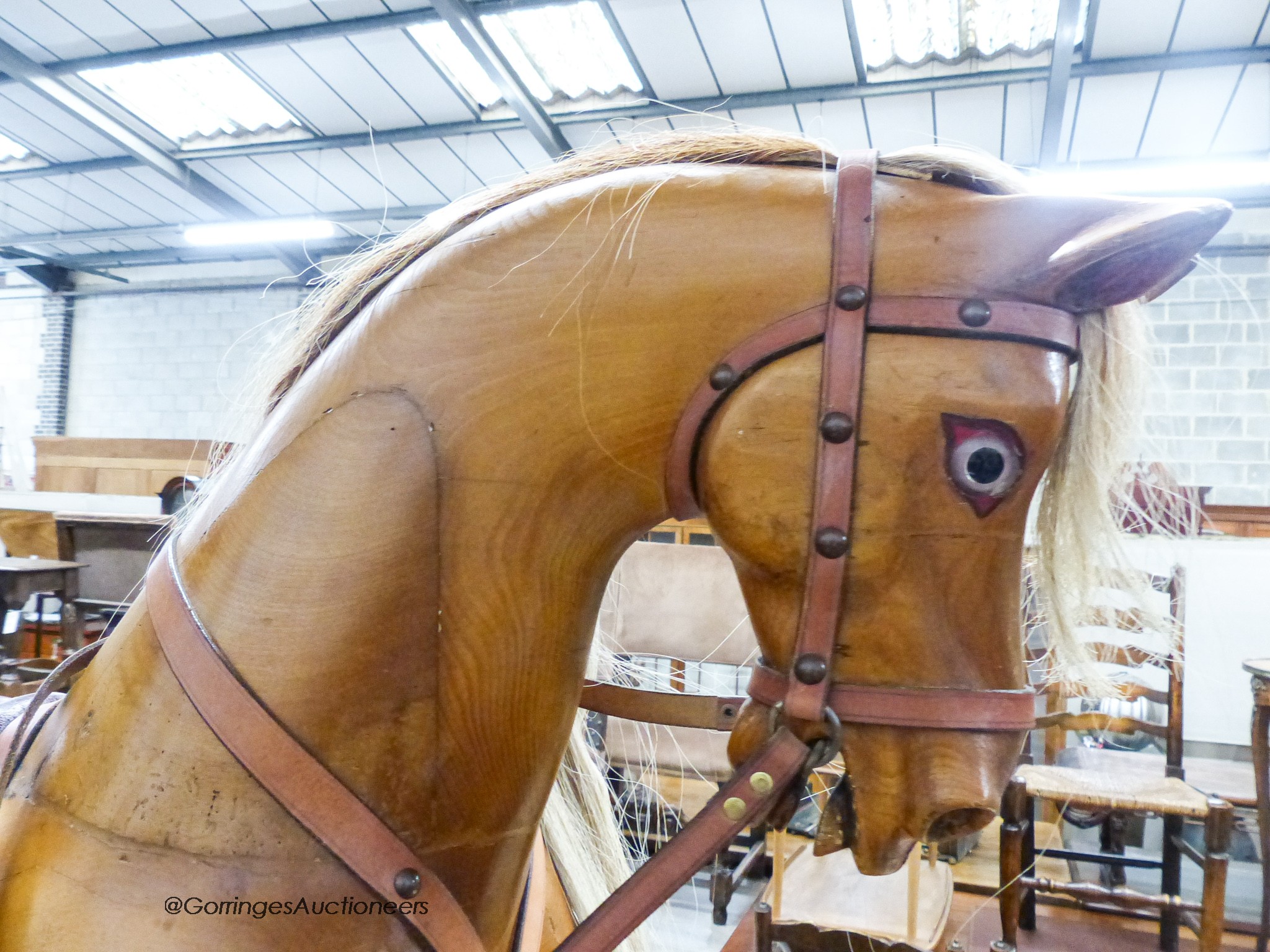 An Edwardian Lines Bros. pine rocking horse, length 144cm, height 126cm